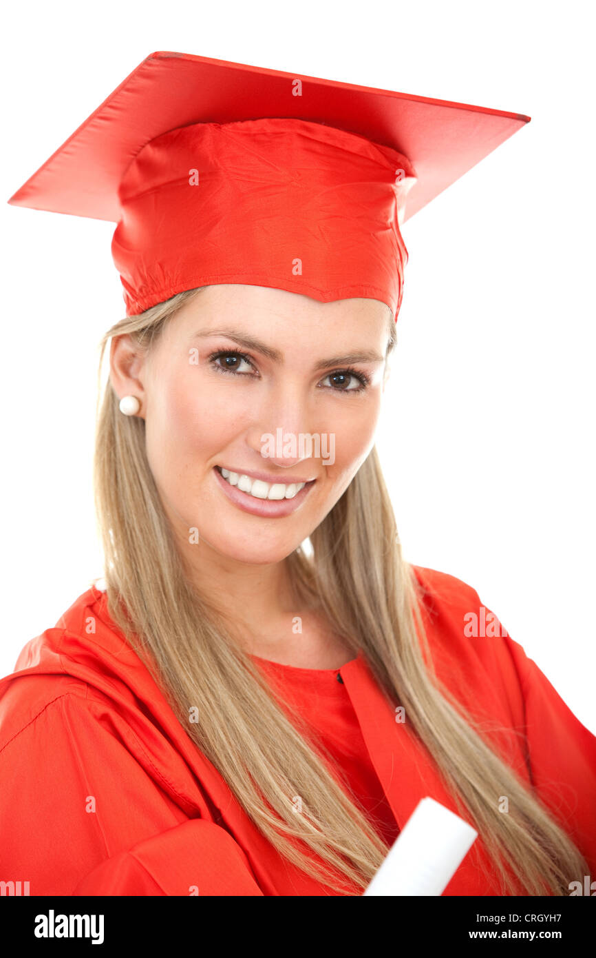 beautiful female graduate in a red gown and mortarboard, holding her diploma Stock Photo