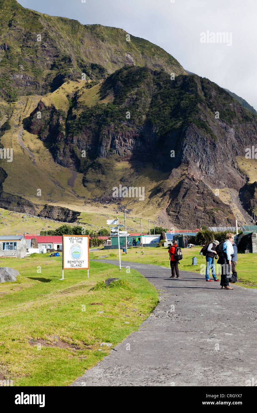 Visitors near the Remotest Island in the World sign, Edinburgh of the Seven Seas, Tristan da