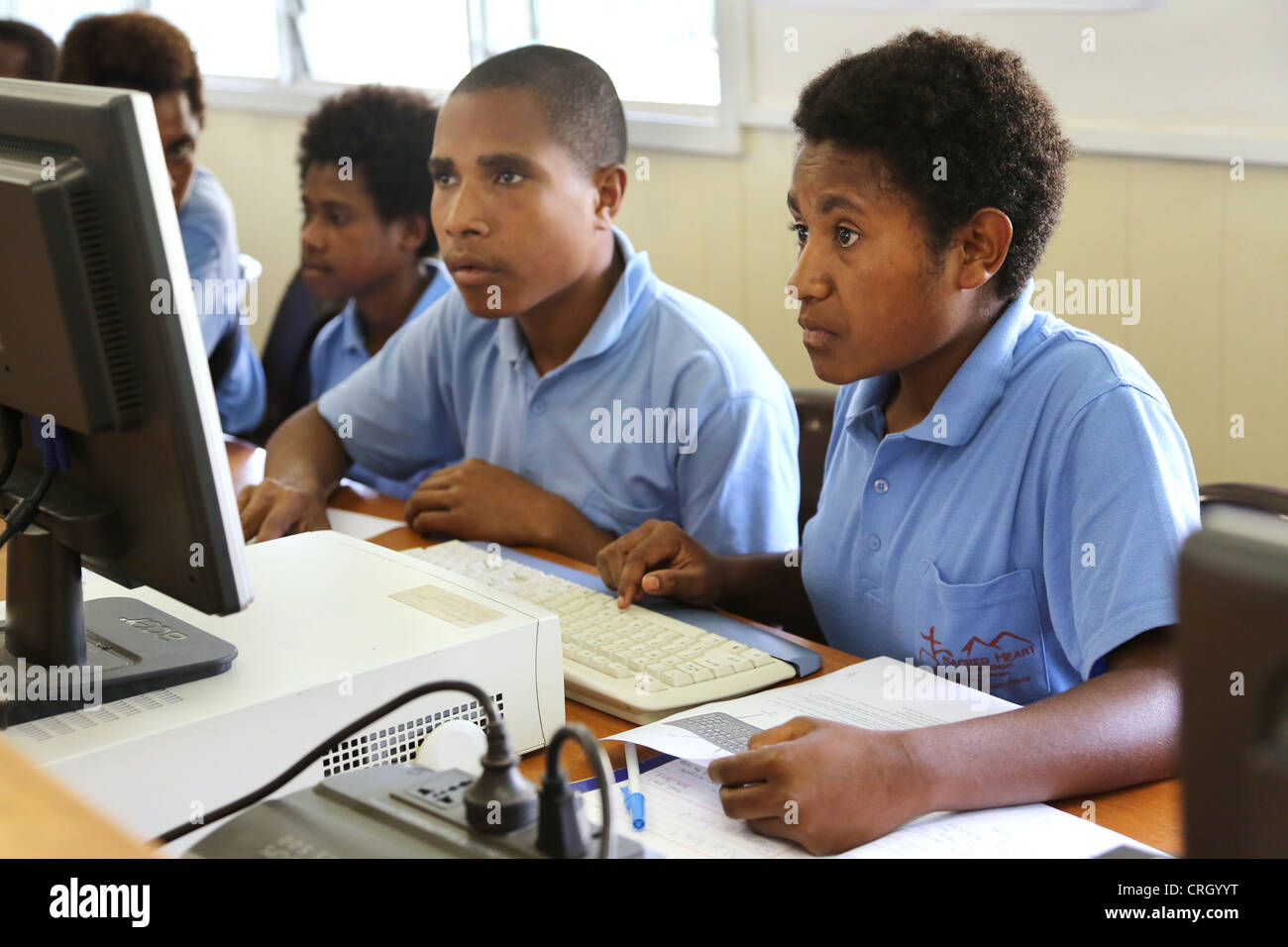 Computer lessons in the Sacred Heart High School in Tapini, Papua New Guinea Stock Photo