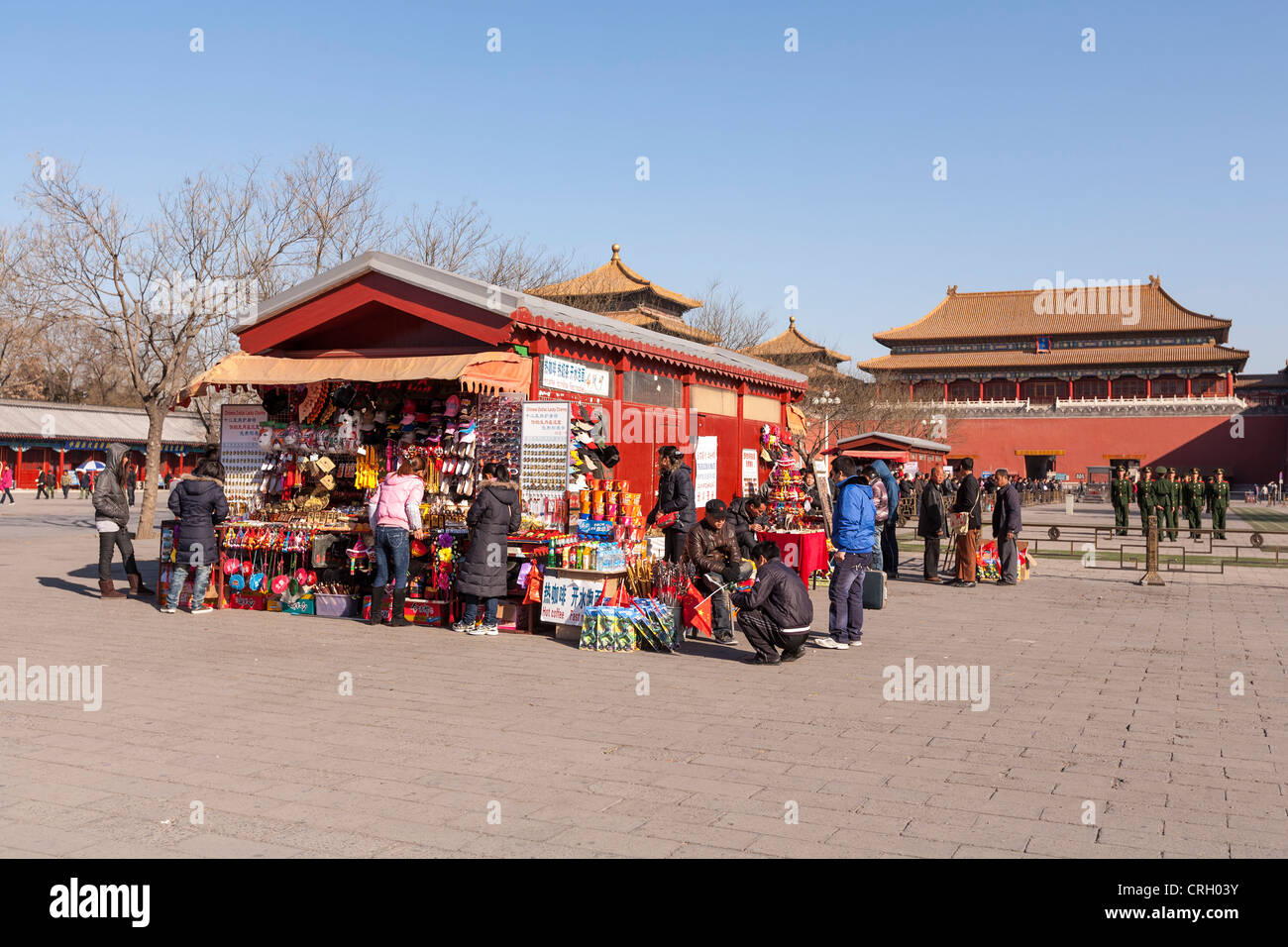 Tourists surround a souvenir stall at the Forbidden City, Beijing, China Stock Photo