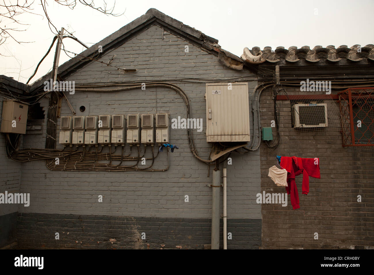 Electric meter boxes on exterior wall of a building, Hutong, Beijing, China, Asia Stock Photo
