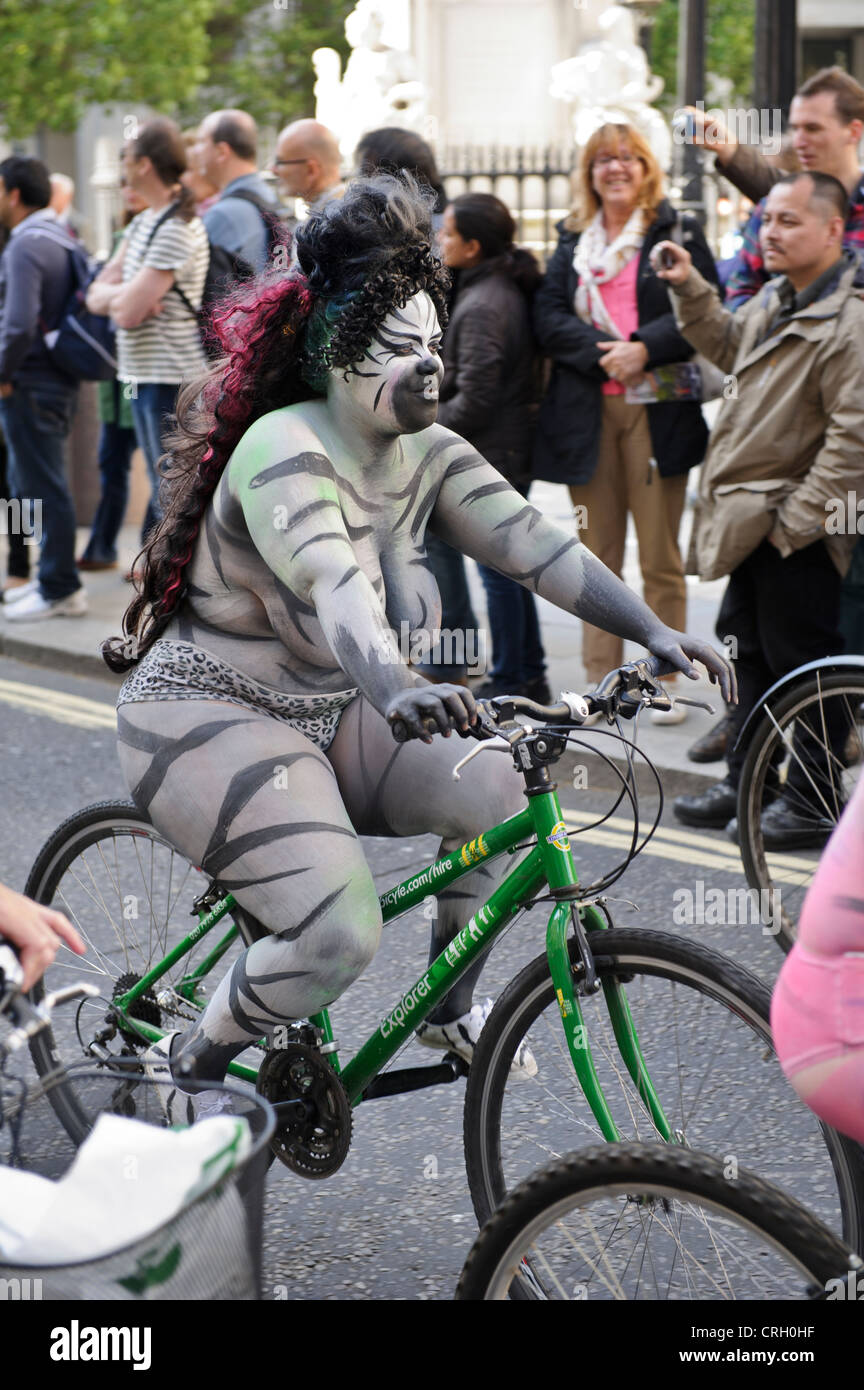 Topless female painted body biker World Naked Bike Ride 2012 London England UK Stock Photo Alamy