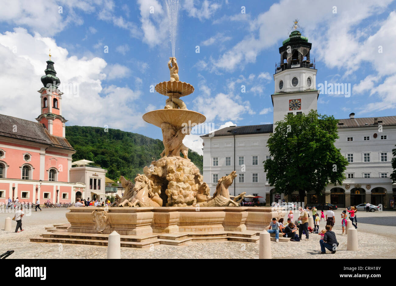 The fountain of the Residenzplatz square in the city centre of Salzburg close to the cathedral. Stock Photo
