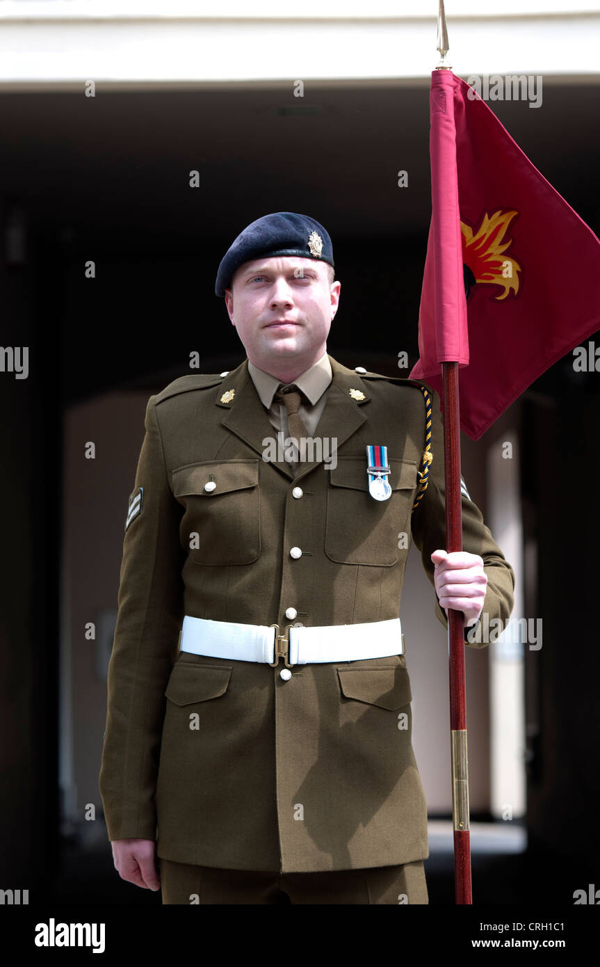 Soldier carrying regimental standard Stock Photo