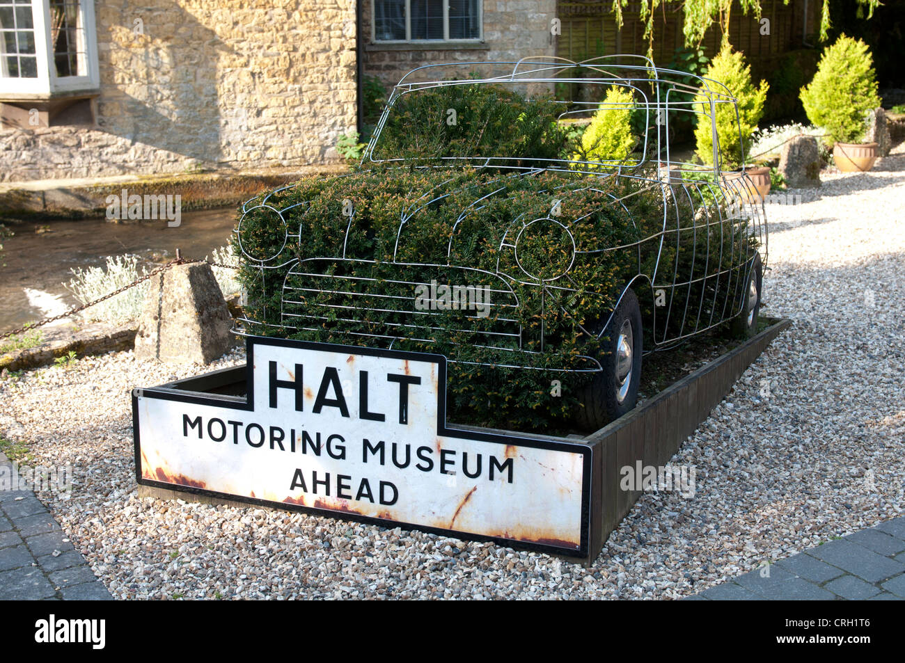 Topiary Mini car at Motoring Museum, Bourton-on-the-Water, Gloucestershire, UK Stock Photo