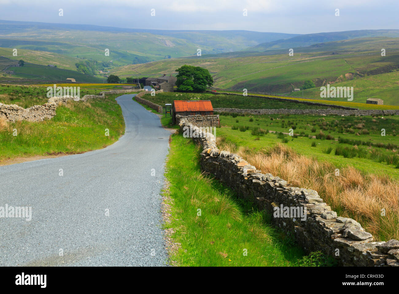 Swaledale, North Yorkshire. The B6270 meanders through well known but remote valley in the Yorkshire Dales. Stock Photo