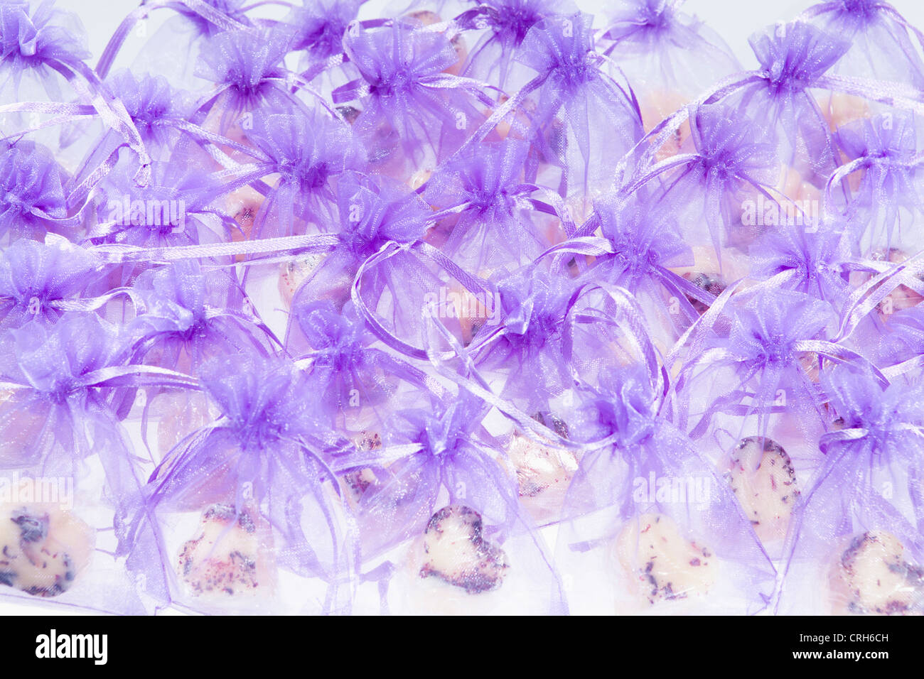 Heart-shaped body butter in chiffon bags Stock Photo