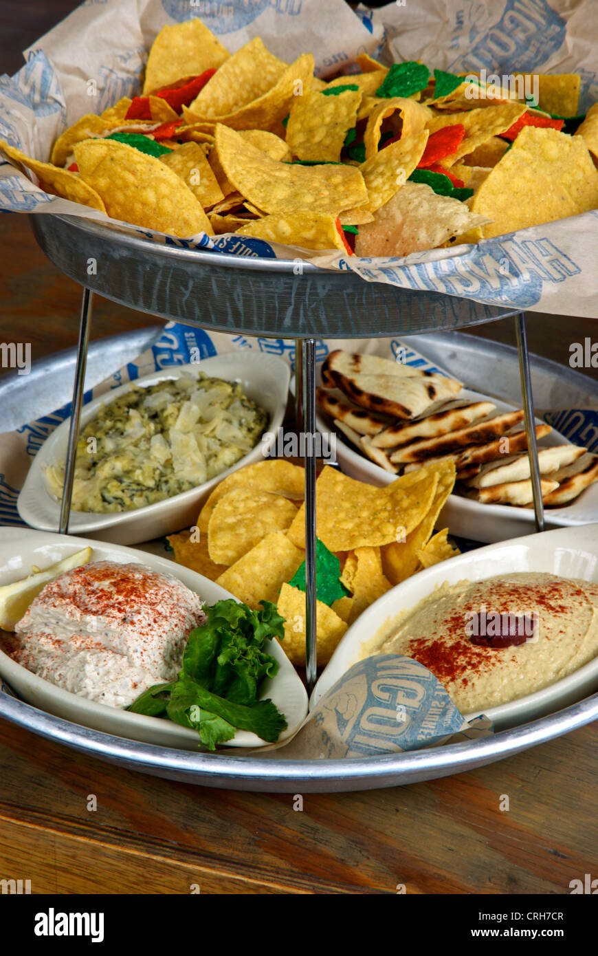 Two tier appetizer tray corn tortilla chips pita bread wedges three