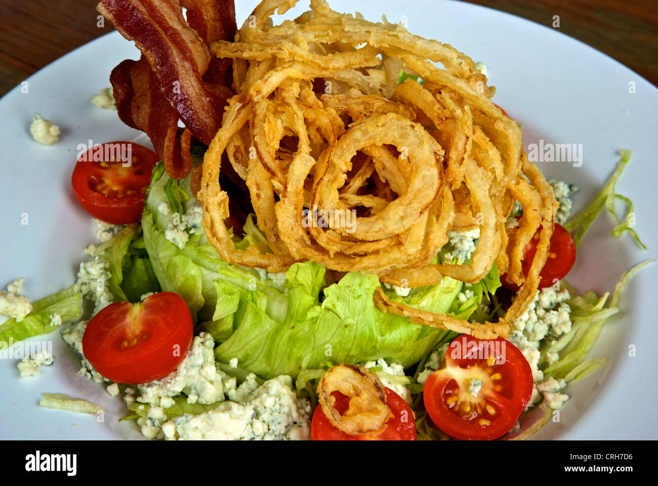 Bacon crumbled blue cheese cherry tomato crispy deep fried onion rings