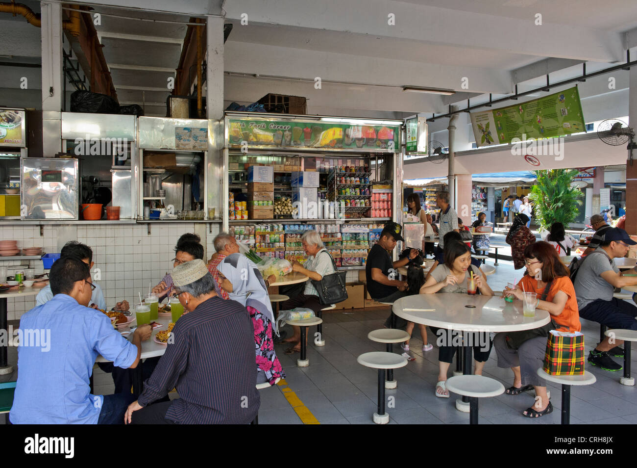 A traditional restaurant with seating areas with dinners, Food Court, Singapore. Stock Photo