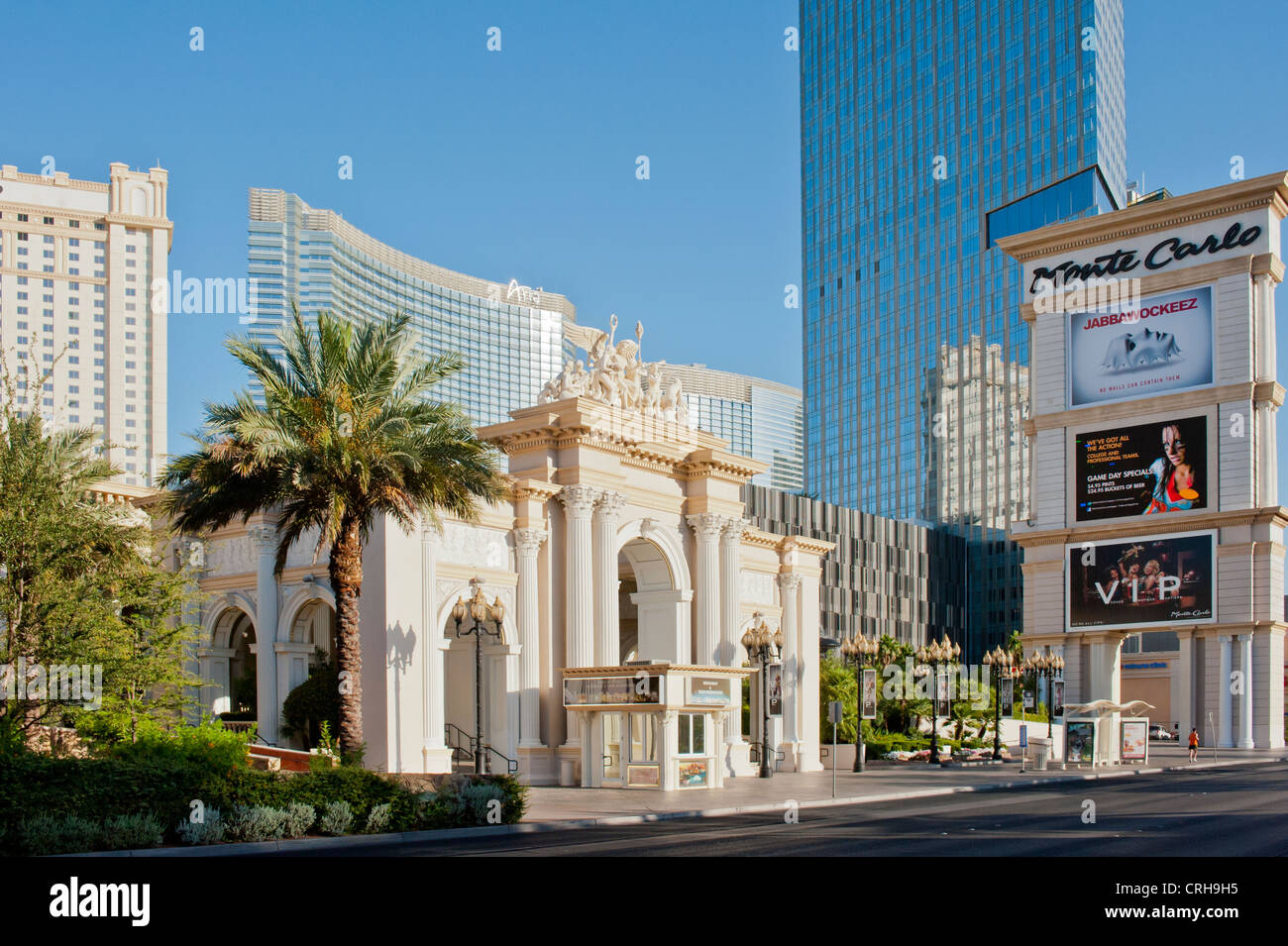The entrance to the Monte Carlo Hotel Casino in Las Vegas, Nevada with the Aria Hotel and City