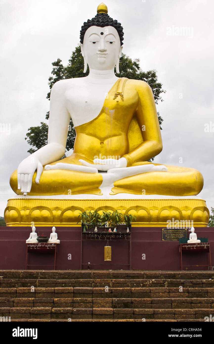 Side of biggest image of buddha In Wianghaeng Chiangmai Stock Photo