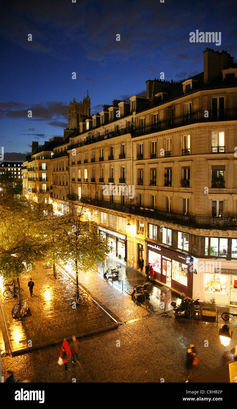 Parisian street at dusk Stock Photo - Alamy
