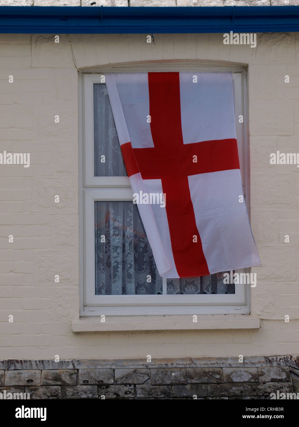 England flag hanging from window hires stock photography and images