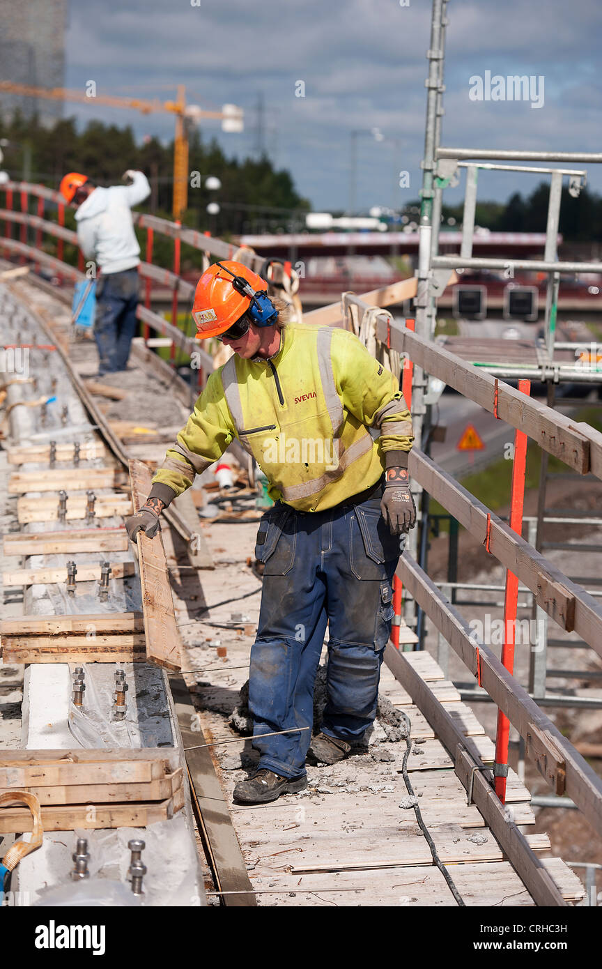 Construction workers on bridge Stock Photo Alamy
