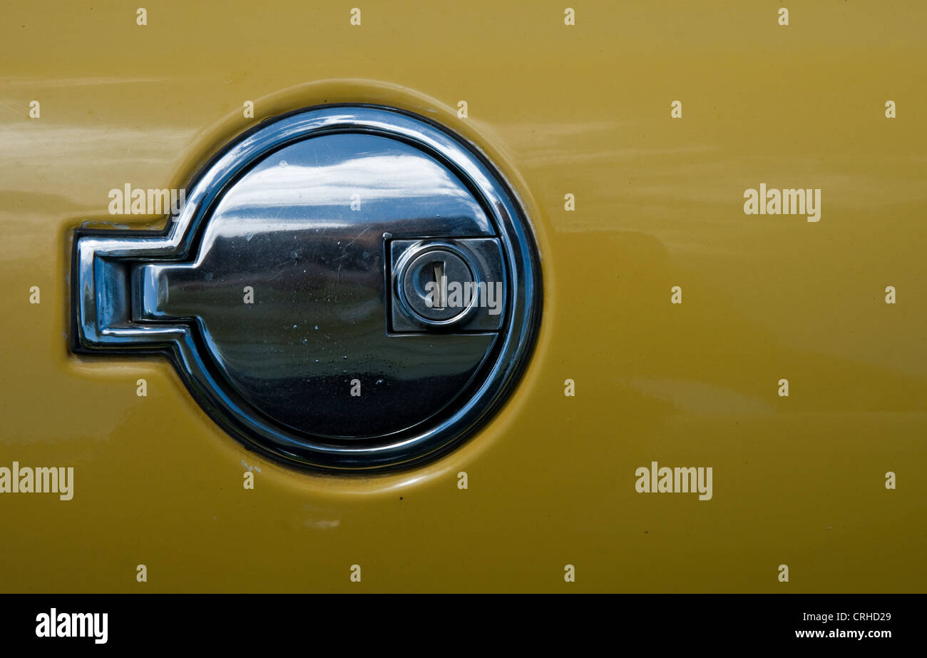 Stag Car petrol cap and logo on a yellow car. Stock Photo
