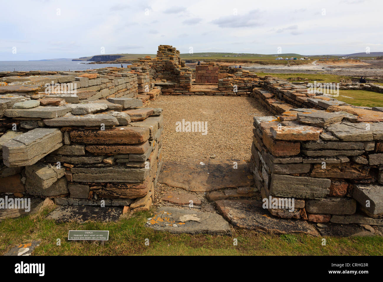 Ruined remains of 12th century Peter Kirk church in Norse settlement excavated on Brough of Birsay Orkney Islands, Scotland, UK Stock Photo