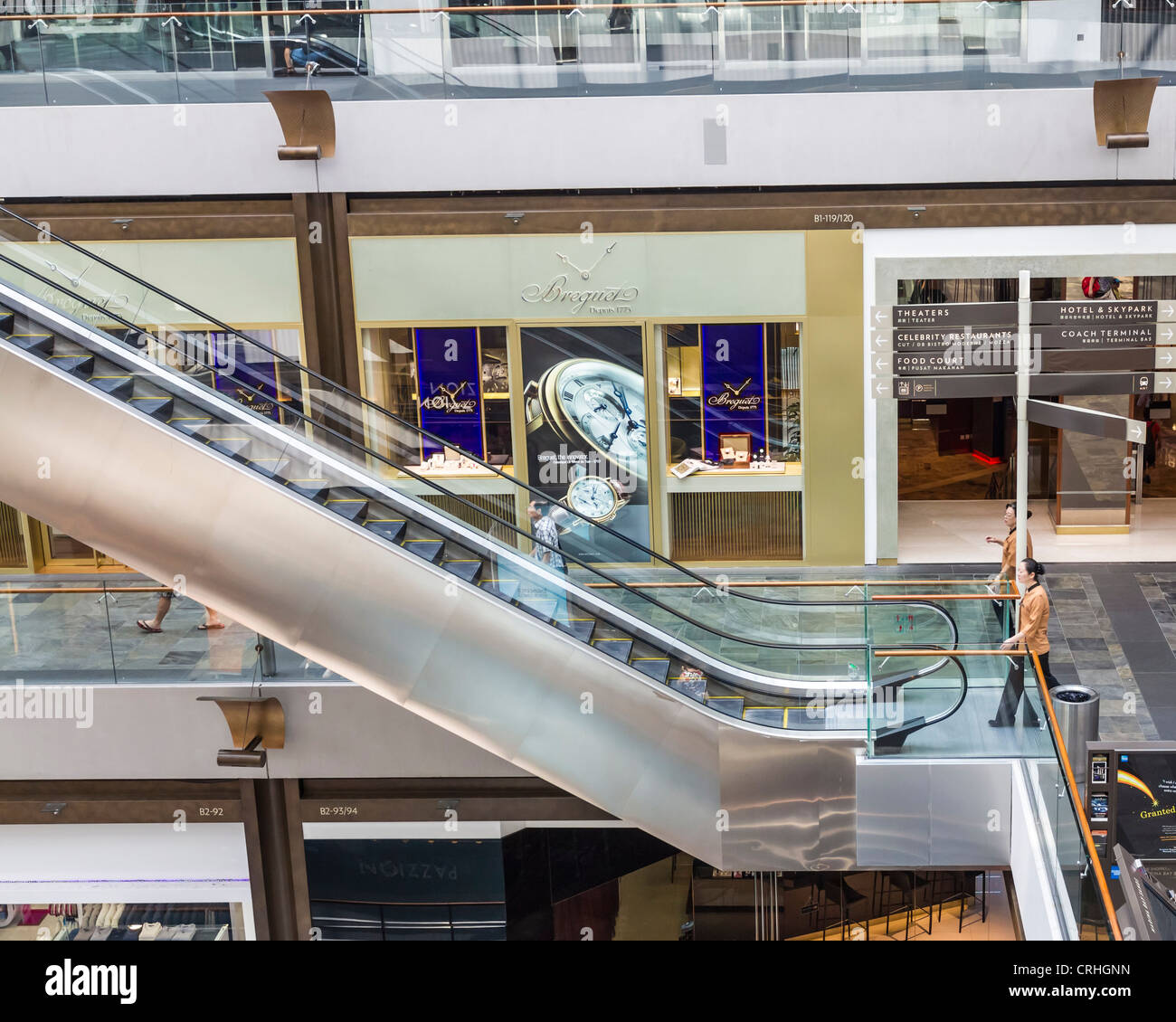 Escalator in the shopping mall in Marina Bay Sands, Singapore. Stock Photo