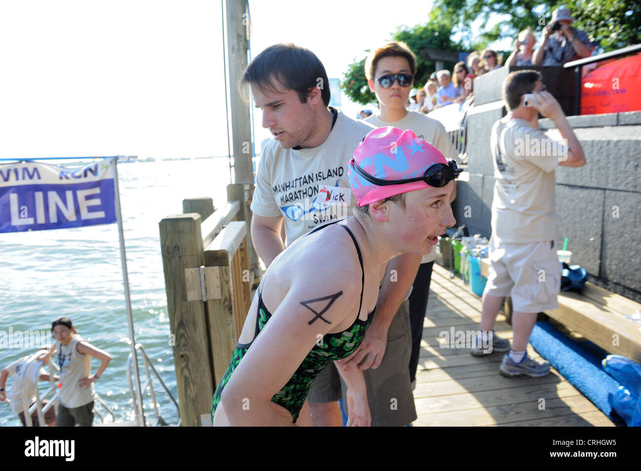 A swimmer after finishing a 28.5-mile circumnavigation of Manhattan, one of the premier open-water swimming events in the world. Stock Photo