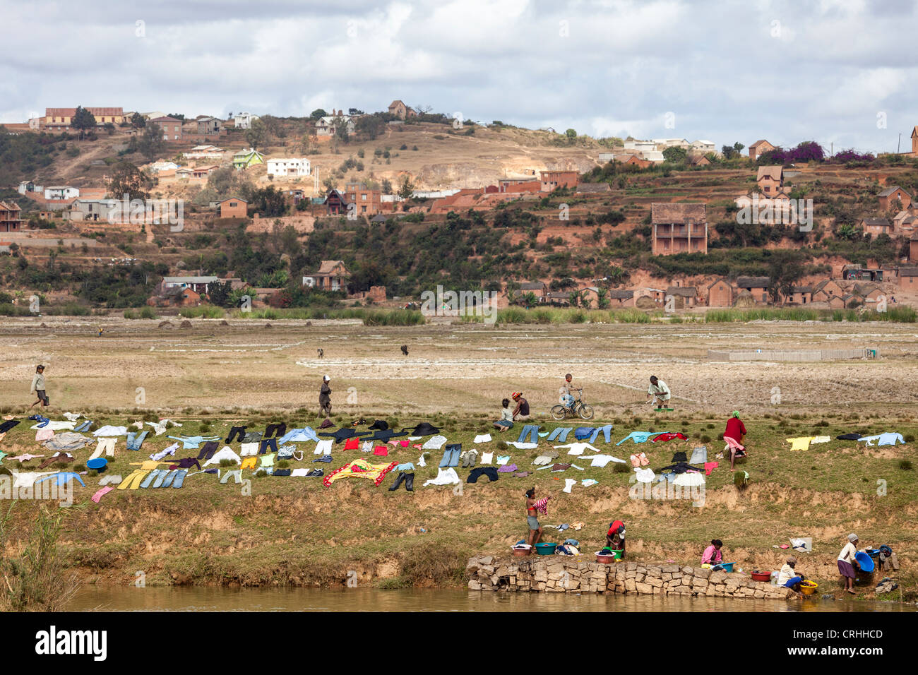 laundry drying on riverbank on the outskirts of Antananarivo, Madagascar Stock Photo