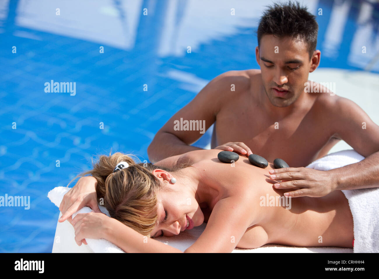 woman getting a hot stone massage Stock Photo