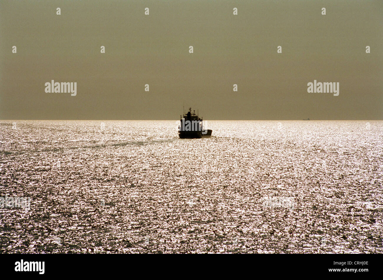 Gulf of Mecklenburg, Baltic Sea, Germany, Container Ship in the evening light Stock Photo