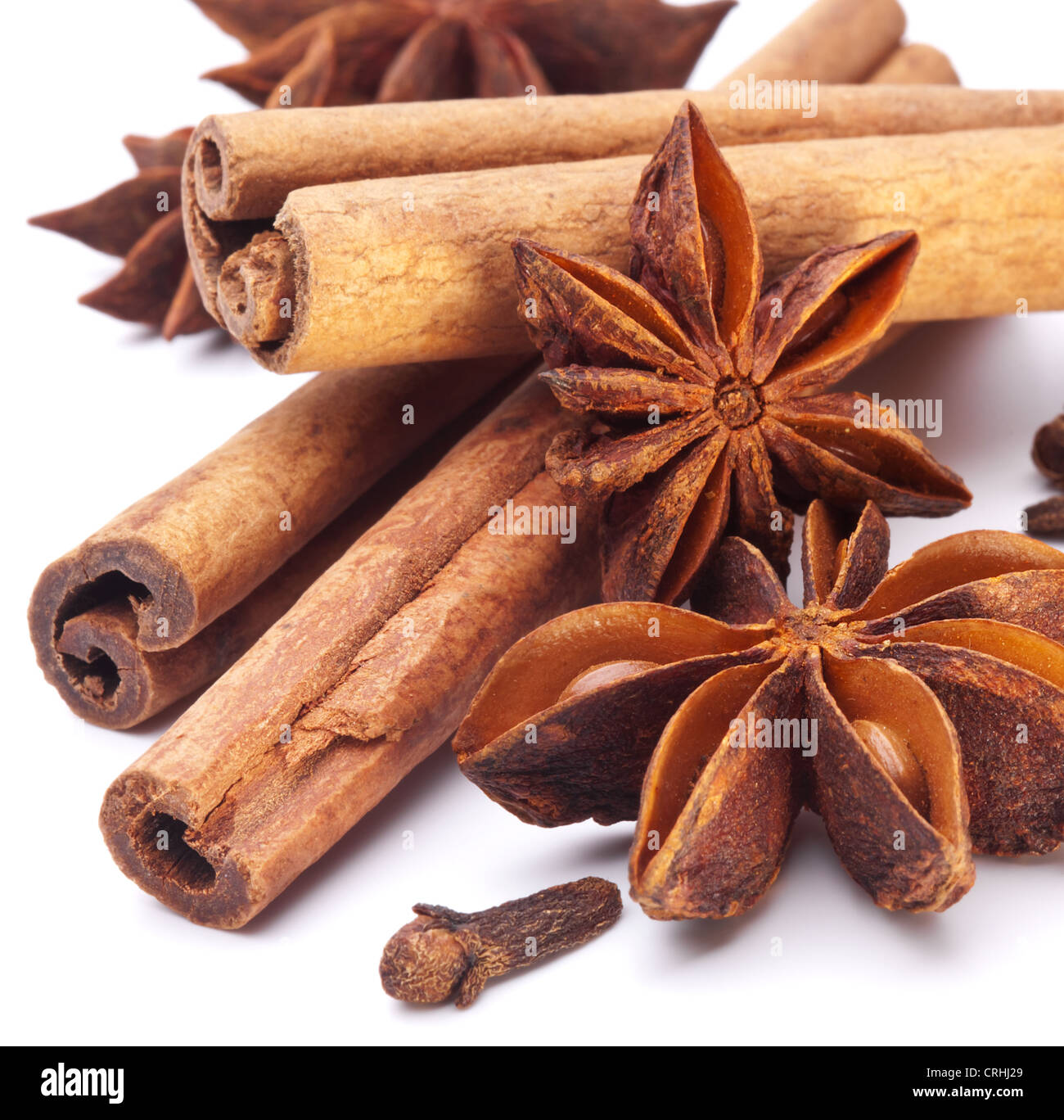 Cloves, anise and cinnamon isolated on white background. Stock Photo