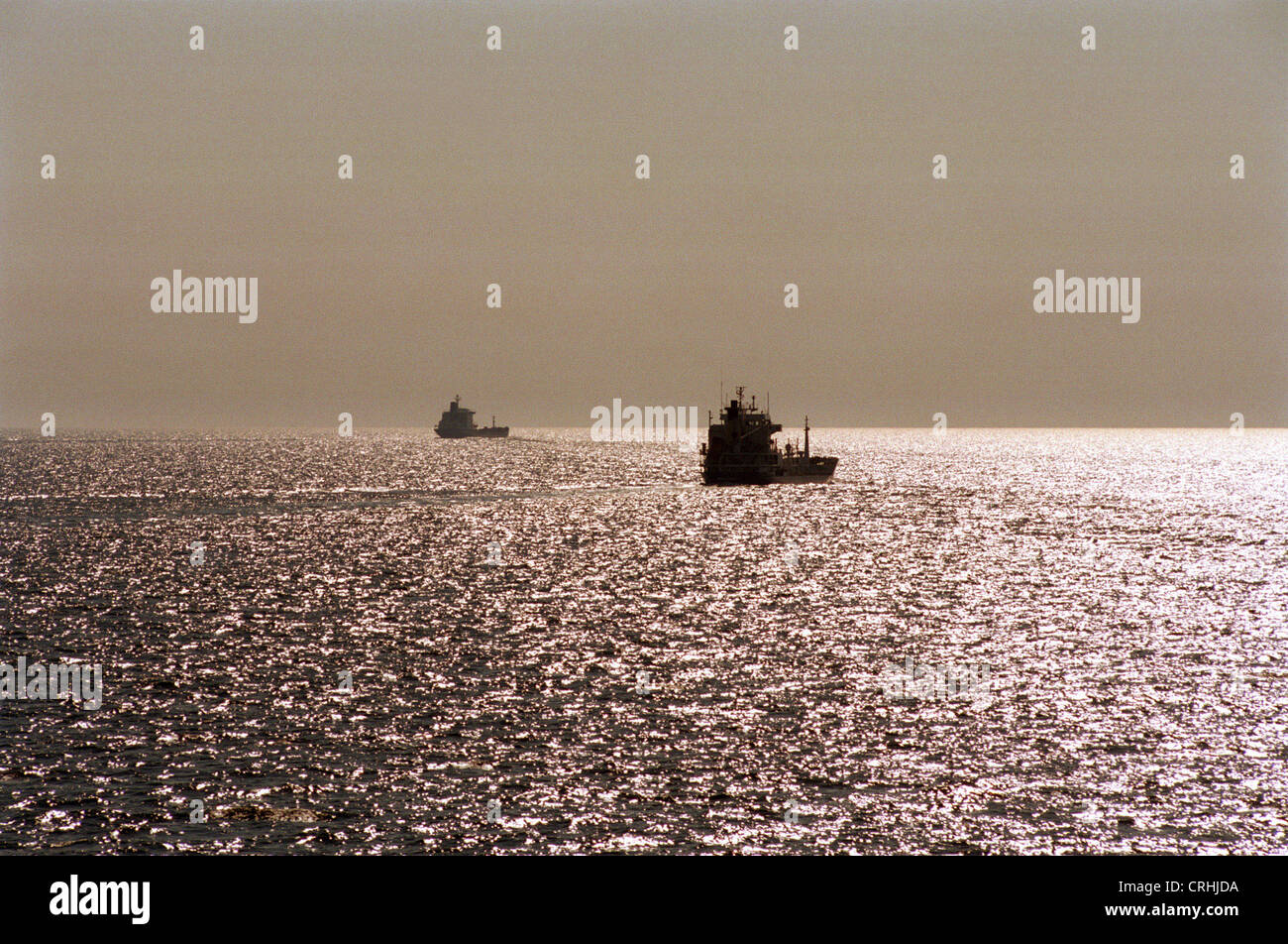 Gulf of Mecklenburg, Baltic Sea, Germany, cargo ships in the evening light Stock Photo