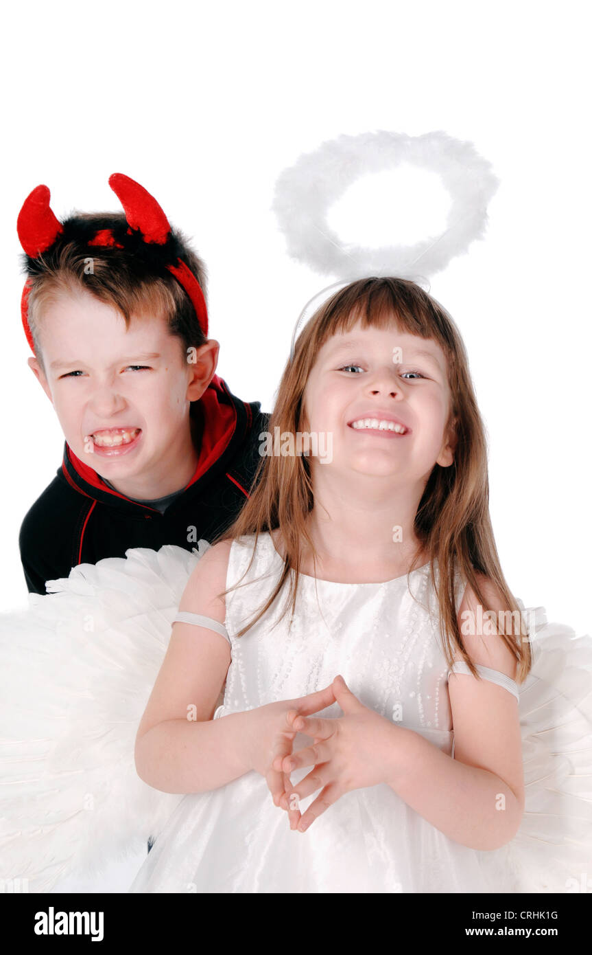 Brothers and sisters an angel and devil Stock Photo