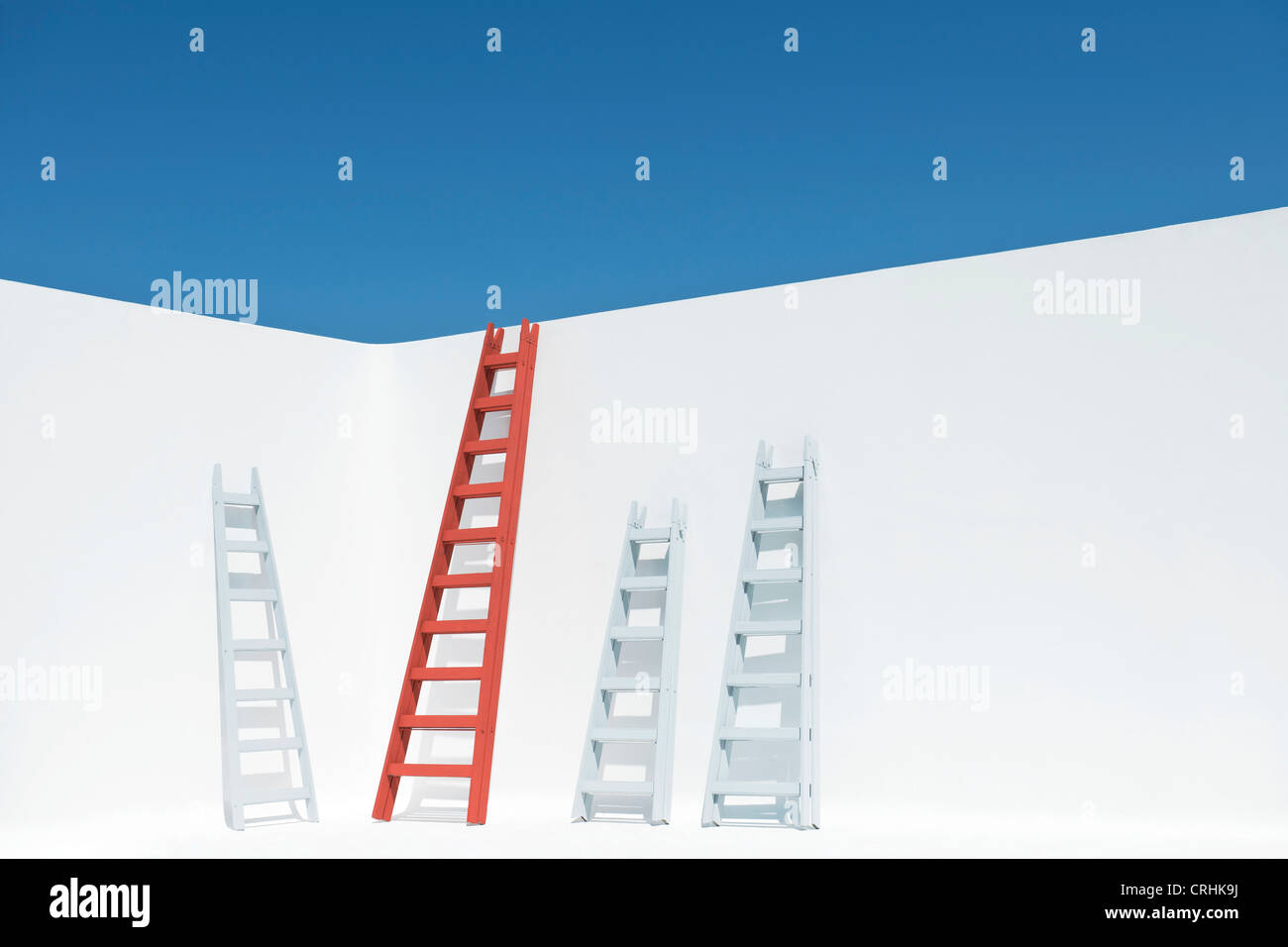 Ladders leaning against wall Stock Photo Alamy
