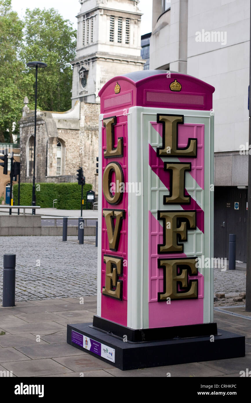 Pink telephone box adorned with the Union flag diamond dust and the message  Long Live Life Love for the BT ArtBox project Stock Photo - Alamy