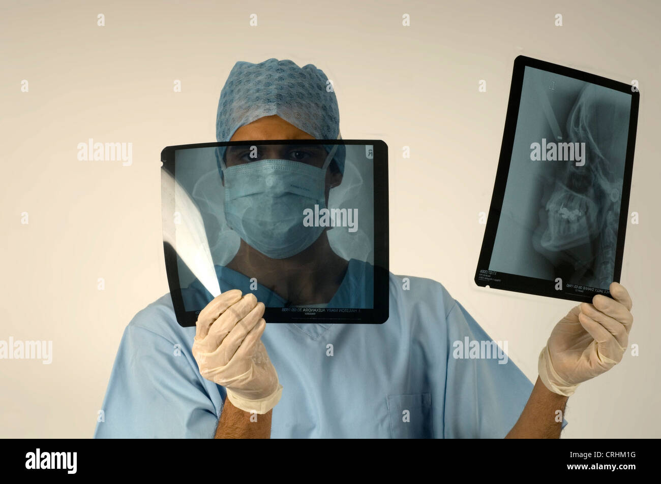 A radiologist studying x-rays. Stock Photo