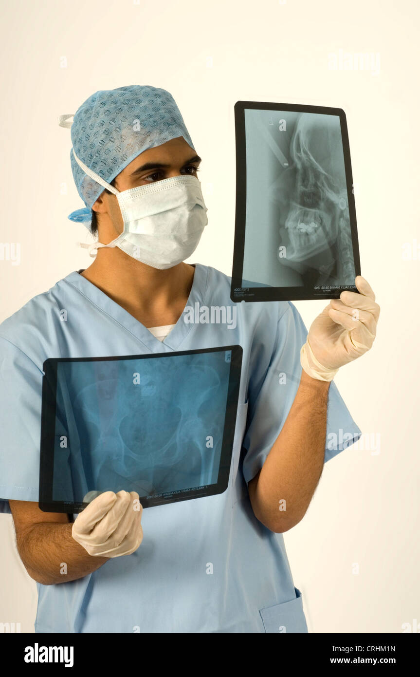 A radiologist studying x-rays. Stock Photo