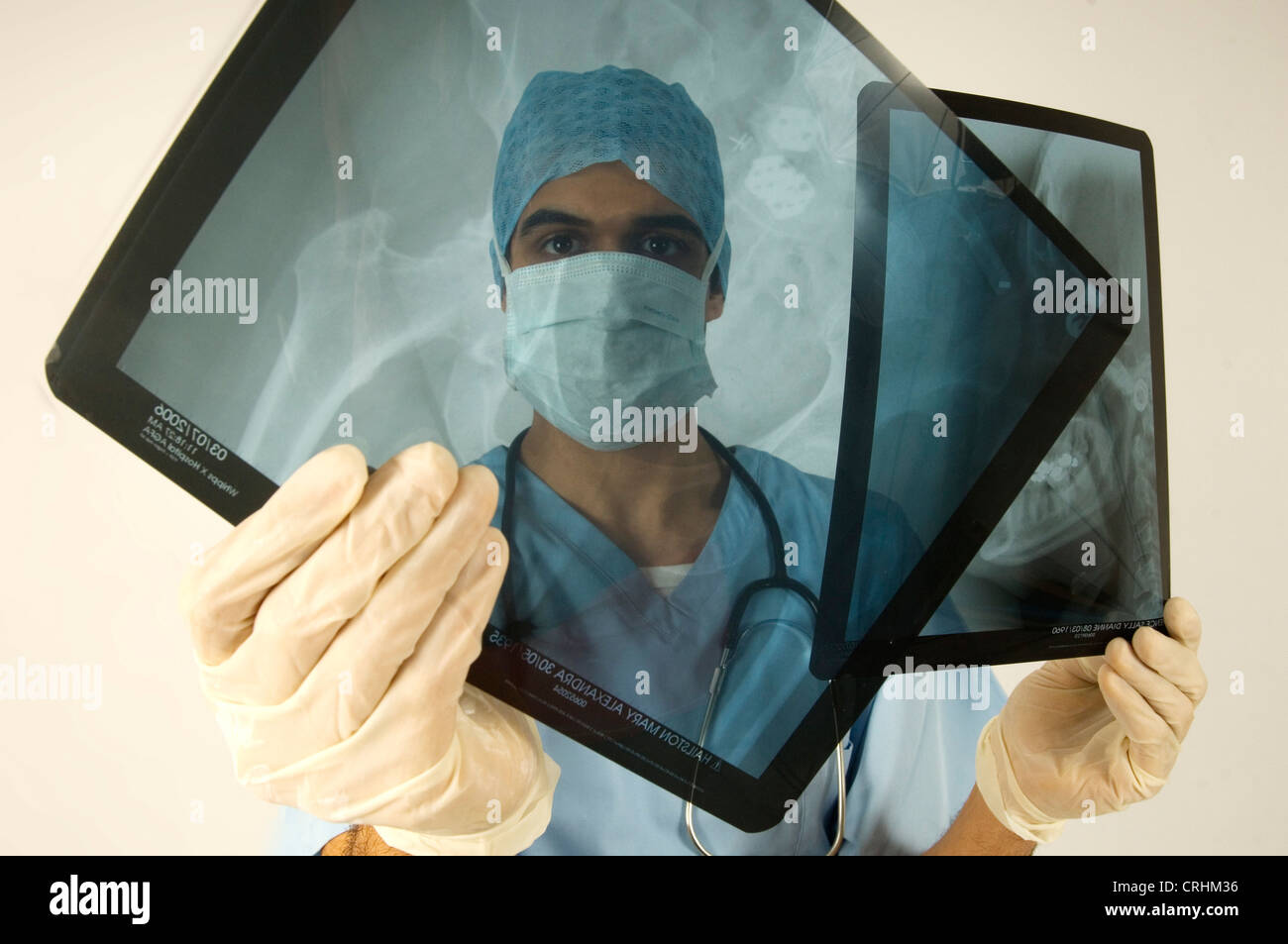 A radiologist studying x-rays. Stock Photo