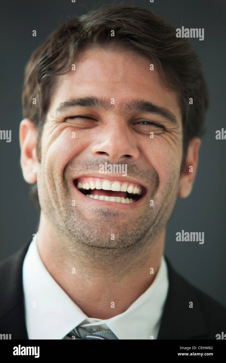 Man bursting out laughing, portrait Stock Photo Alamy