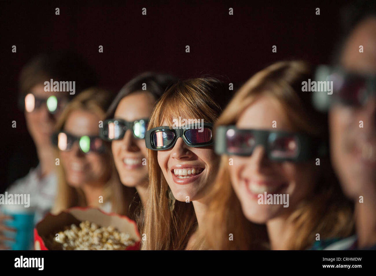 Audience wearing 3D glasses in movie theater Stock Photo Alamy