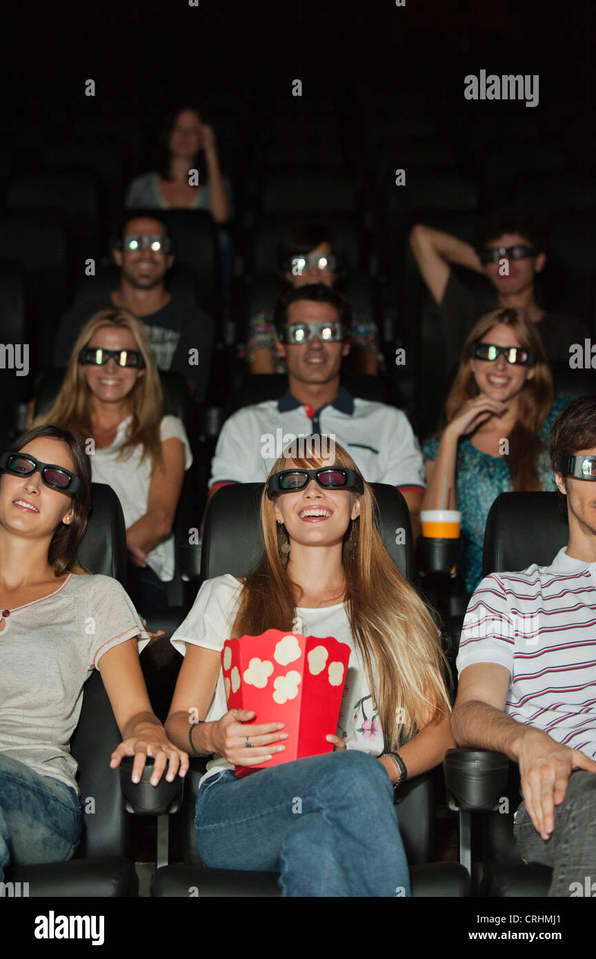Audience wearing 3D glasses in movie theater Stock Photo Alamy
