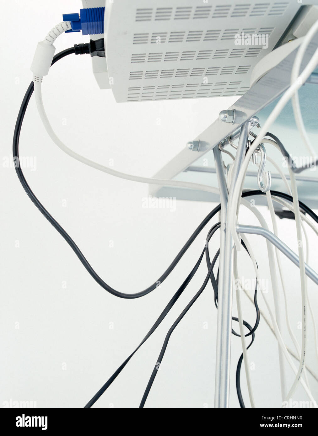 Cable mess under a desk with computer Stock Photo Alamy