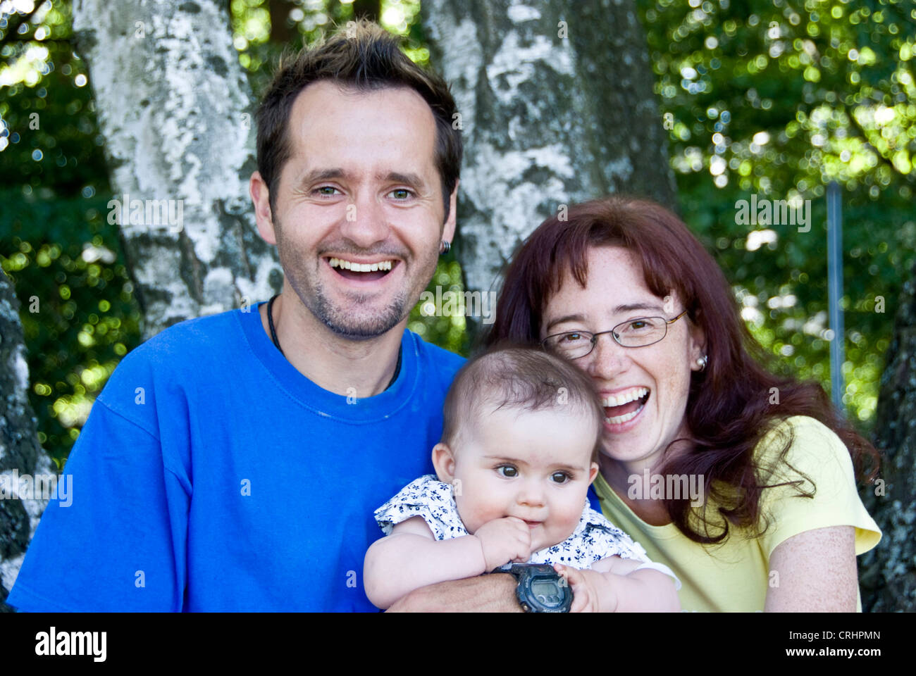 parents with baby Stock Photo