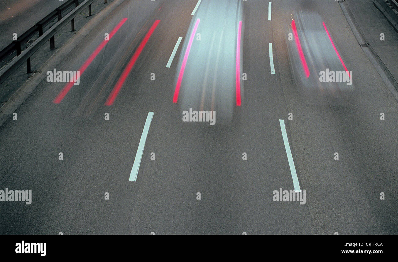 Lights of cars on a motorway lane Stock Photo