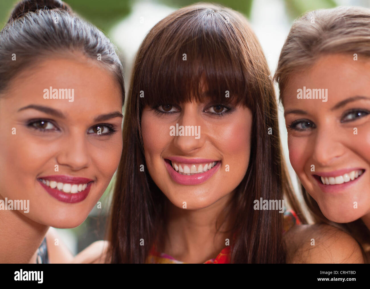 Women posing close together hi-res stock photography and images - Alamy