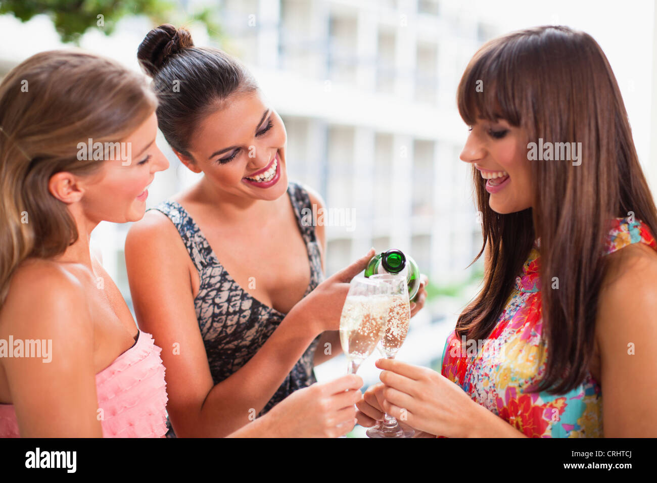 Women drinking champagne together Stock Photo