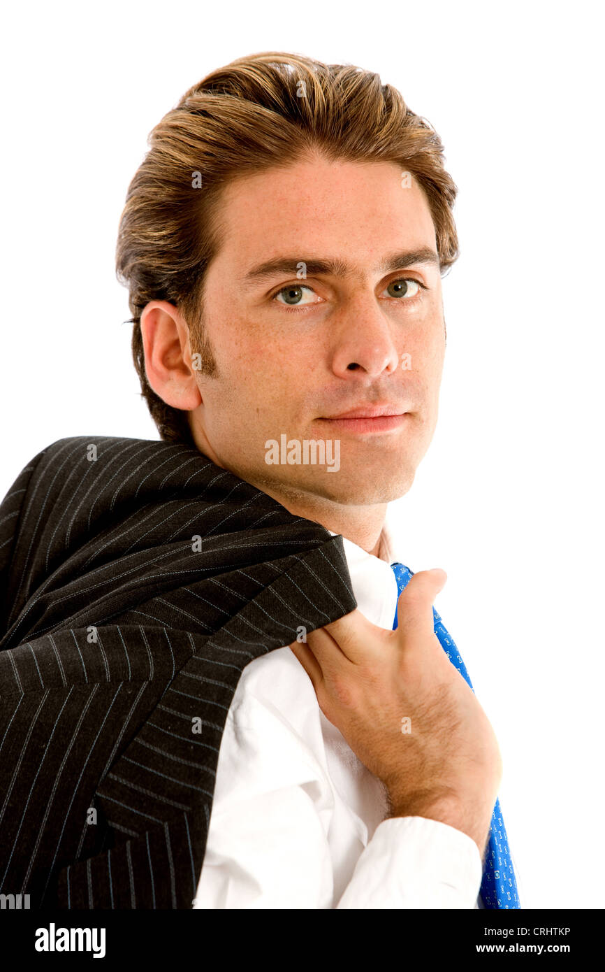 businessman smiling with jacket at the shoulder Stock Photo