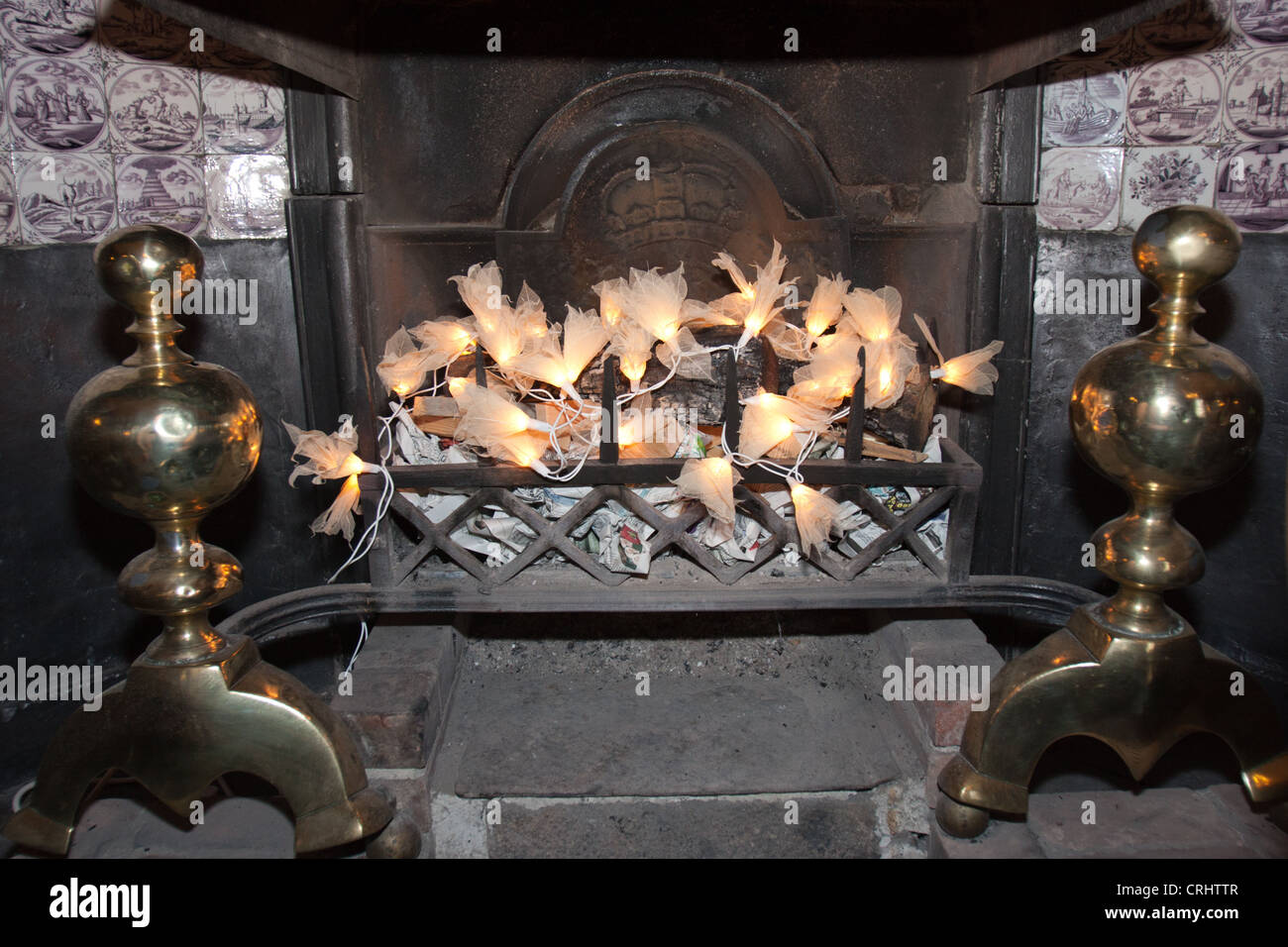 A close up image of a traditional Victorian fireplace with a modern twist  using fairy lights instead of fire Stock Photo - Alamy