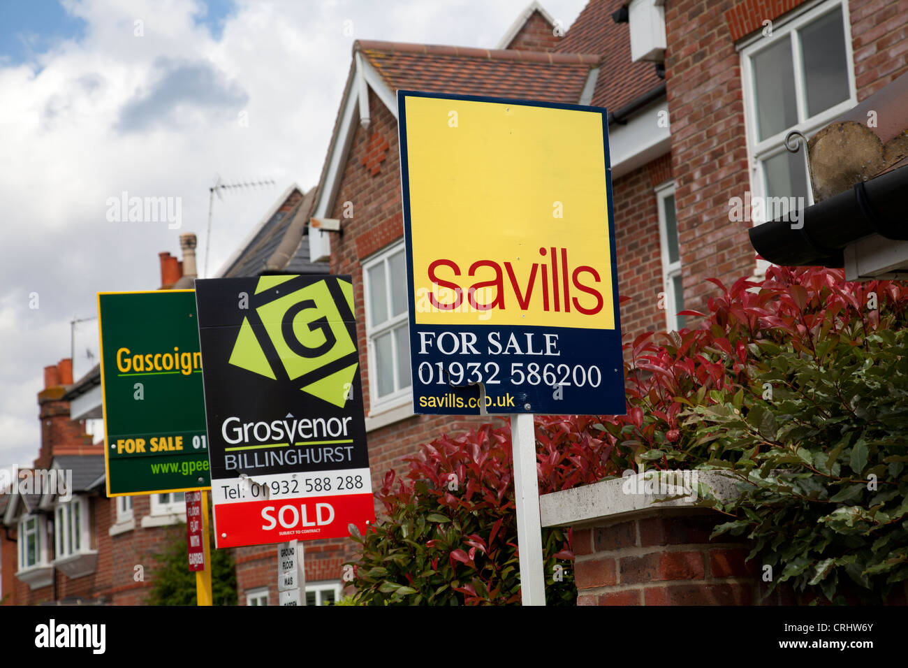 Estate Agent Signs in Cobham Surrey UK Stock Photo Alamy