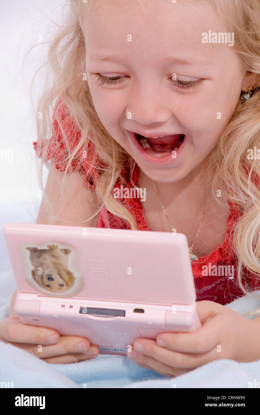 girl with computer game Stock Photo