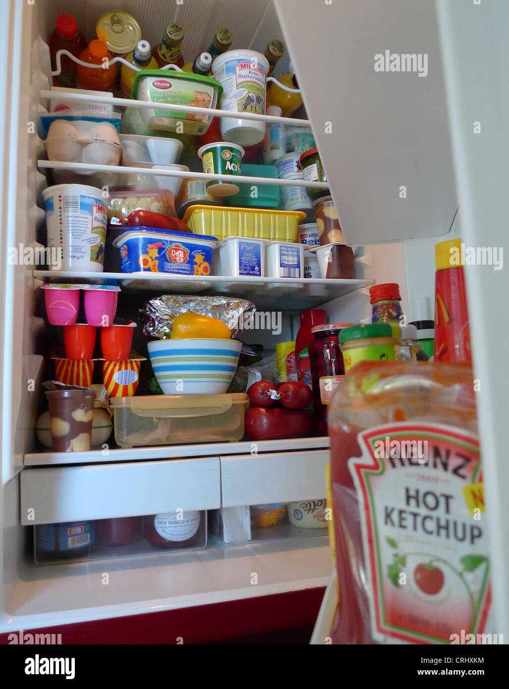 view into well-filled fridge Stock Photo