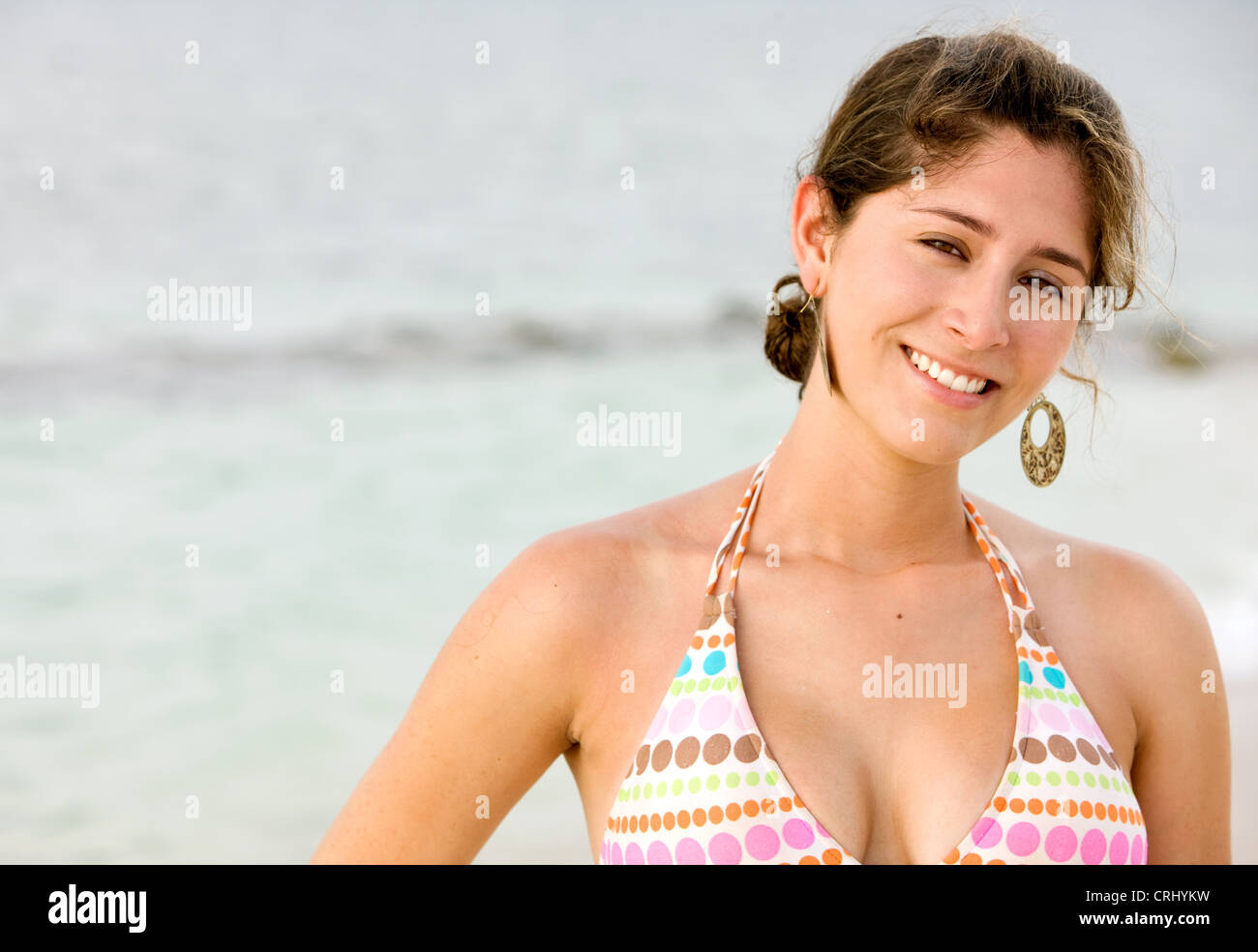 Beautiful woman with sexy face looks at camera. Stock Photo by valuavitaly