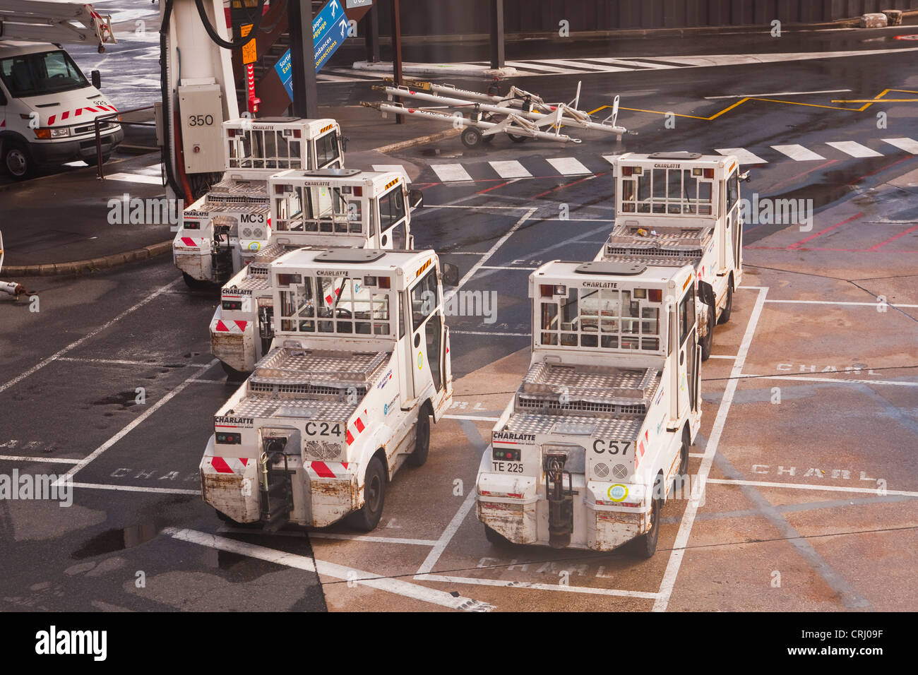 Air France baggage trucks waiting at Orly airport in the south of Paris