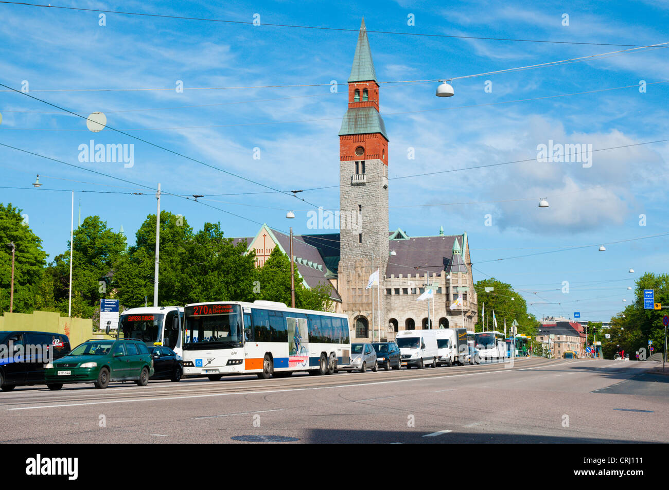 Traffic on Mannerheimintie street in front of Kansallismuseo the National Museum building central Helsinki Finland Europe Stock Photo